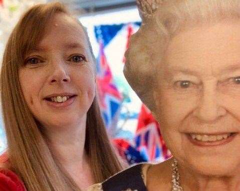 Michele Taylor at Homely Gifts Rainham with her cardboard cutout of the Queen