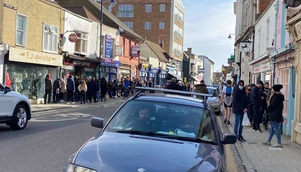 A photo shows crowds lining the streets in Whitstable last month when the sun was shining