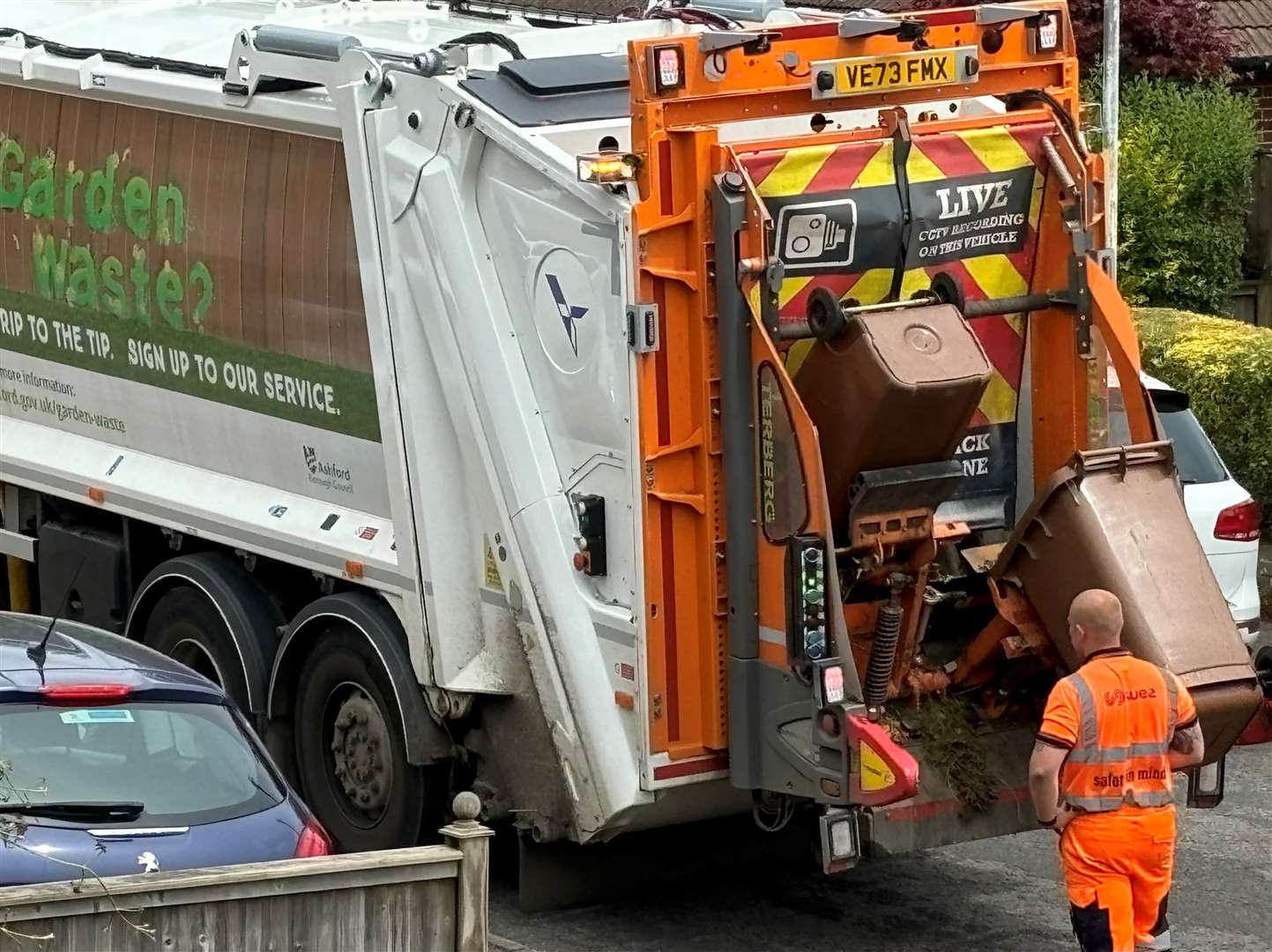 Suez workers collecting garden waste in Ashford