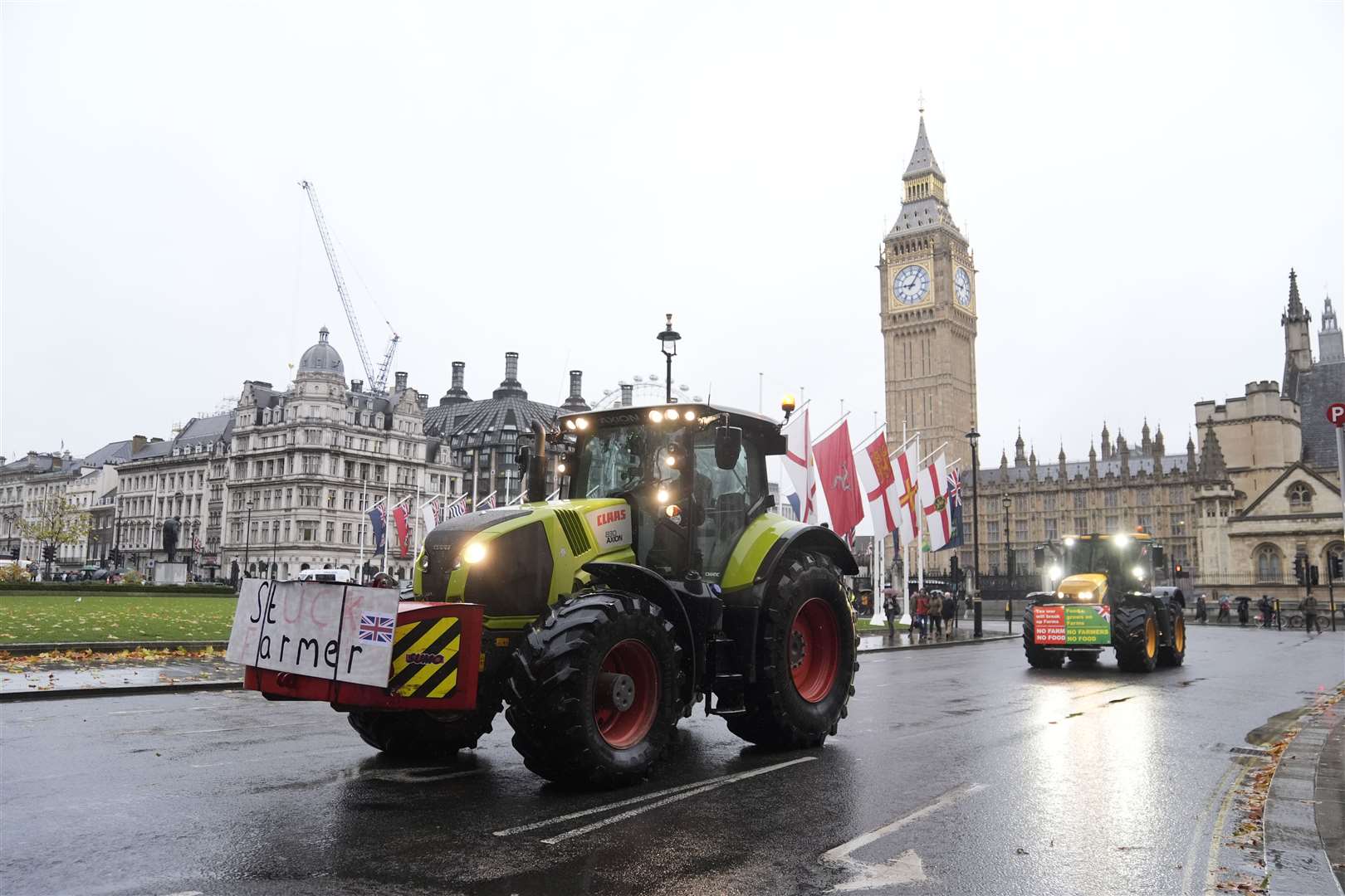 Farmers in tractors drove in Parliament Square, London, ahead of a protest on Tuesday over changes to inheritance tax rules (Andrew Matthews/PA)