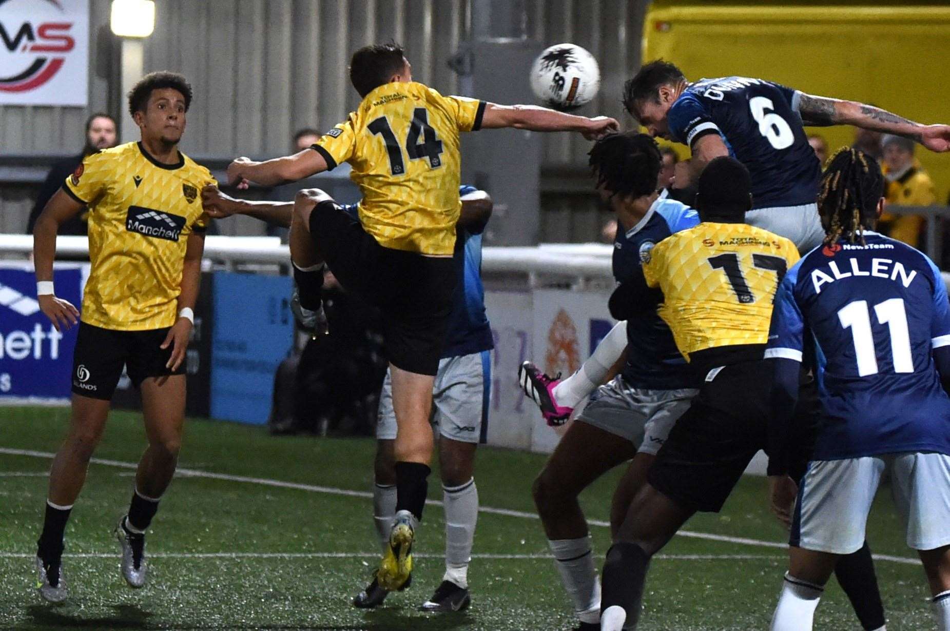 Goalmouth action as Dover’s James Dunne clears under pressure from Matt Rush. Picture: Steve Terrell