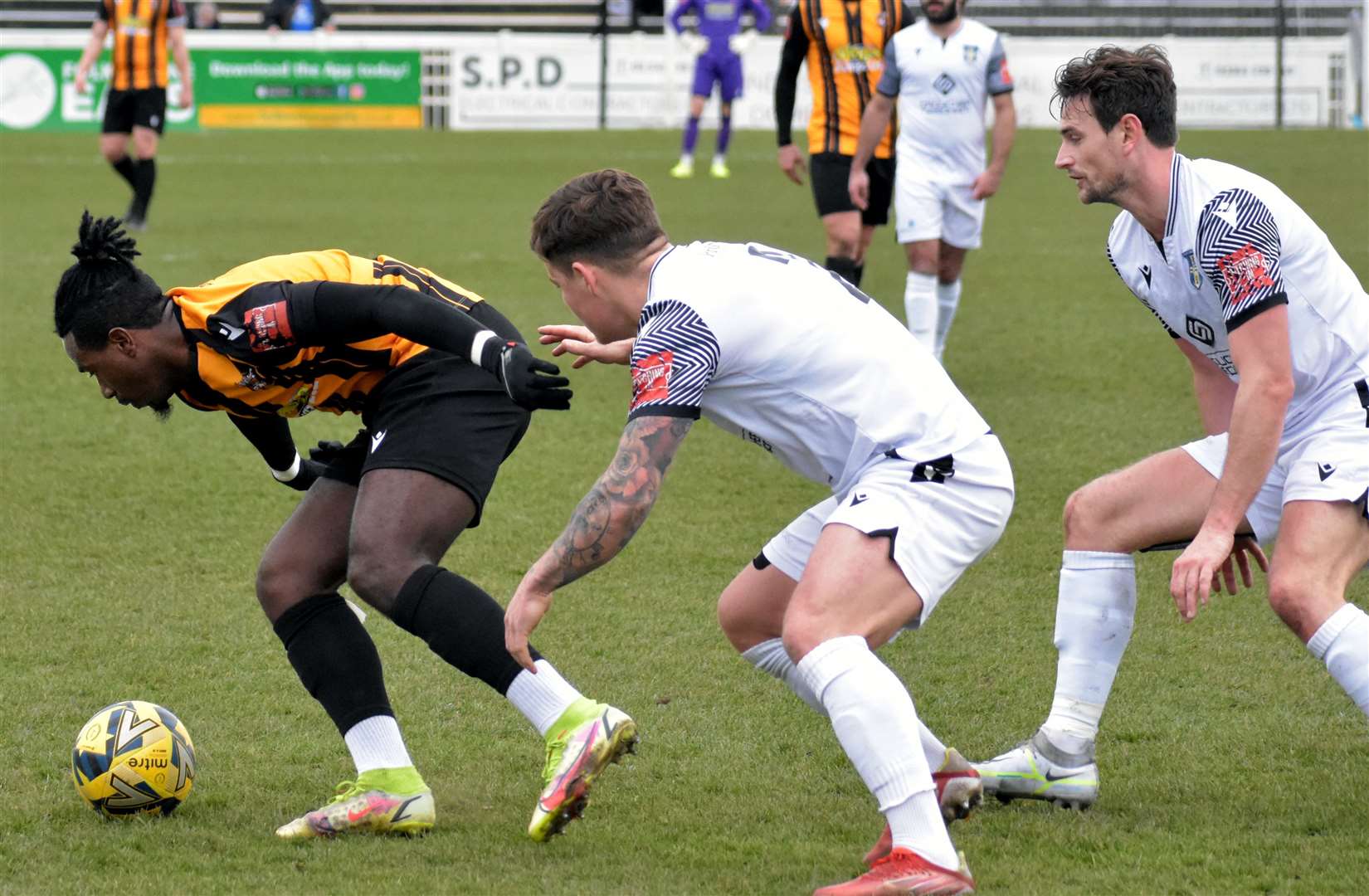 Two-goal Folkestone forward Ira Jackson is put under pressure. Picture: Randolph File