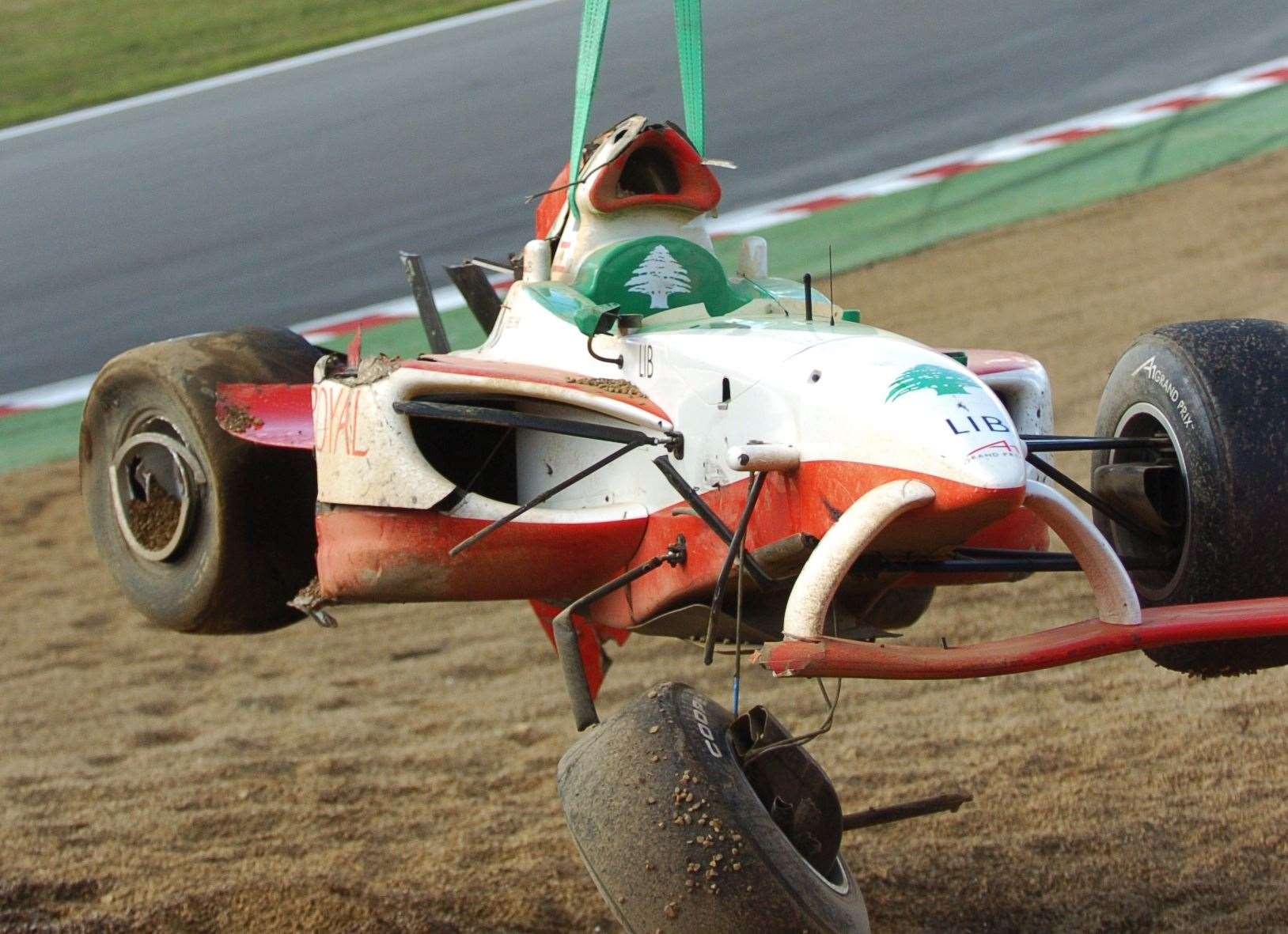 The race continued as the wreckage of the Lebanese car was taken away. Picture: Barry Goodwin