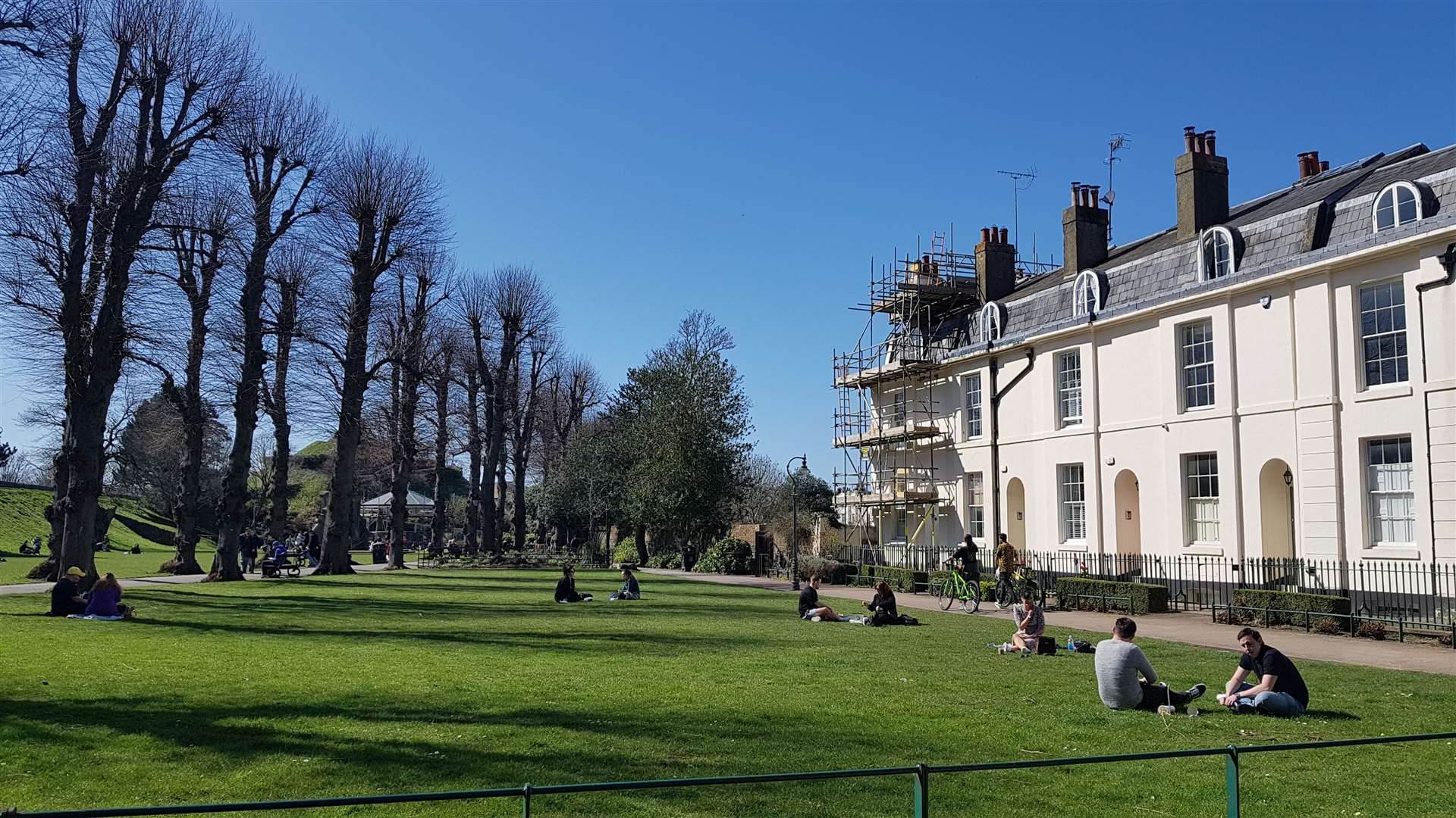 Groups of people were dotted about on the grass in the Dane John Gardens on Monday