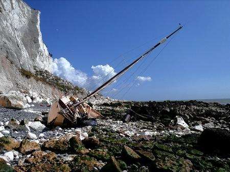 Boat dashed against the rocks at St Margaret's