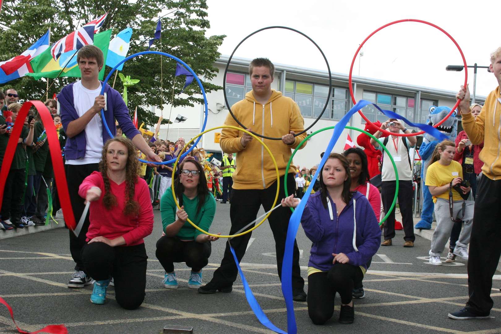 A colourful display. Waiting to greet the arrival of the flame at Ashford's North School. Pic: Mary Louis