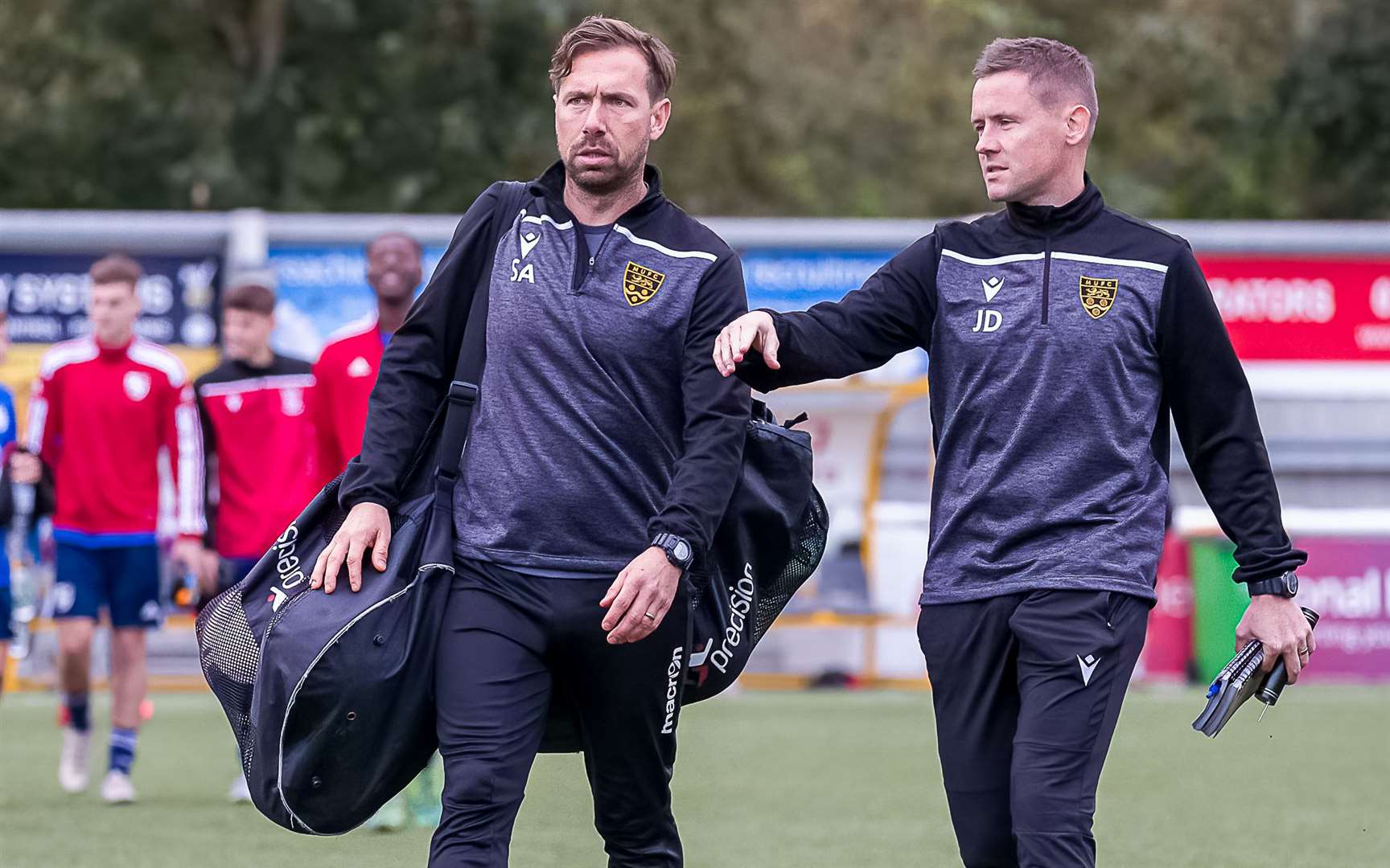 Faversham manager Simon Austin, left, and assistant Joe Dowley. Picture: Helen Cooper