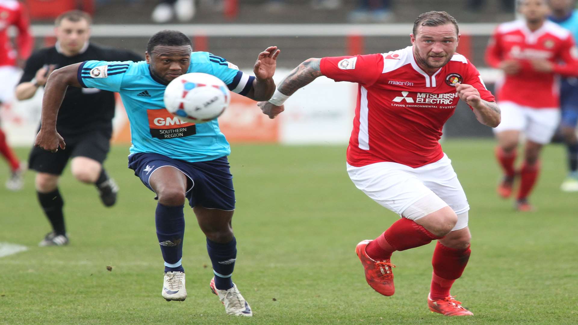 Danny Kedwell, right, gives chase. Picture: John Westhrop