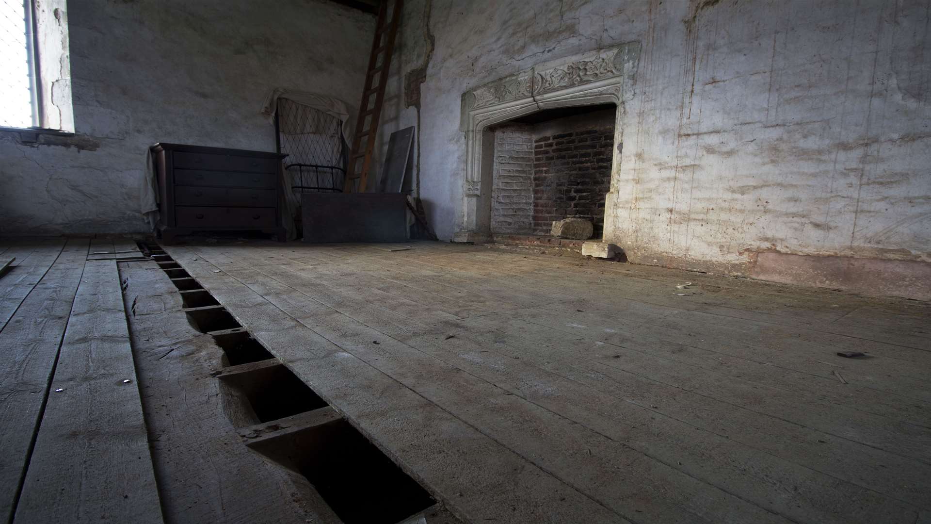 Raised floorboards reveal the witchmarks in the Upper King’s Room. Picture: National Trust, Martin Havens