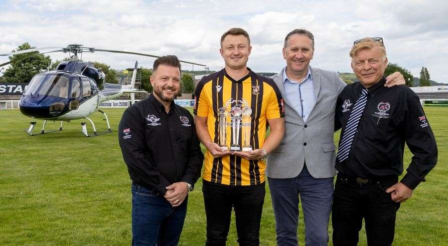 Left to right - Alcaline UK Limited general manager David Zaccheo, departing Folkestone captain Callum Davies, Neil Shaw and Alcaline UK Limited chief executive Lorenzo Zaccheo - are all smiles at Cheriton Road