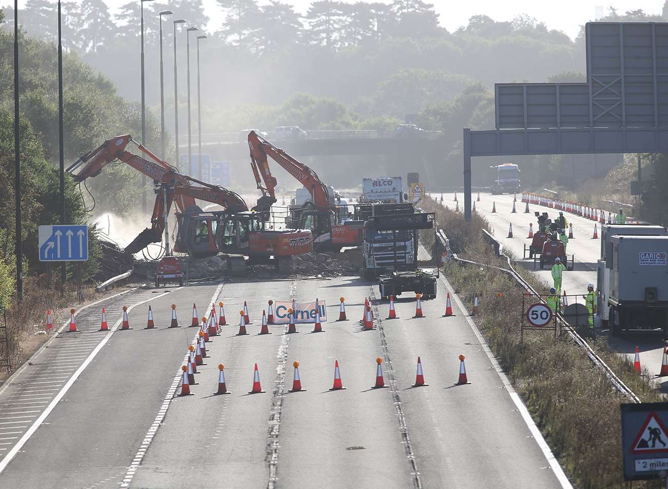 The collapsed footbridge has now been demolished by specialist teams. Picture John Westhrop