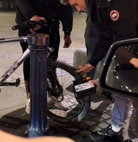 The group helped pump up his bike. Picture: @milliescriven/TikTok