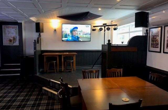 There is a raised stage in one corner of the pub – I assume this might be used by bands or perhaps visiting DJs