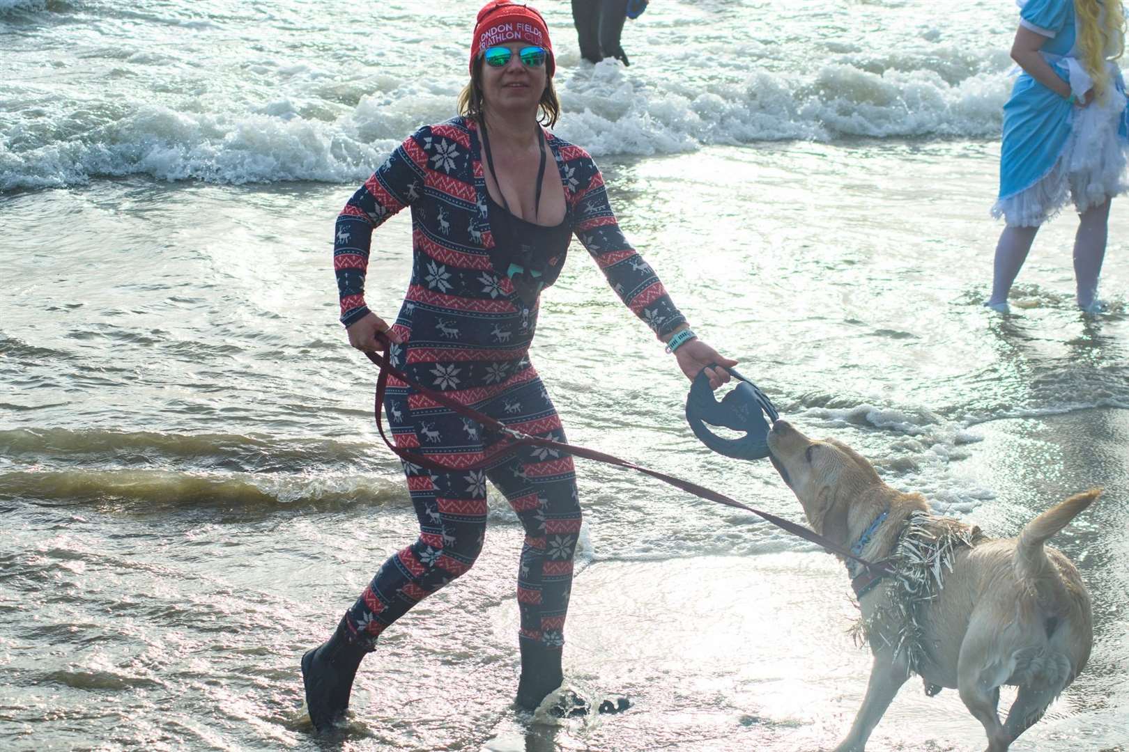 Hardy, brave or completely mad... hundreds took to the water at Folkestone's Sunny Sands. Picture: Shaun Ranger/Folkestone, Hythe and District Lions Club