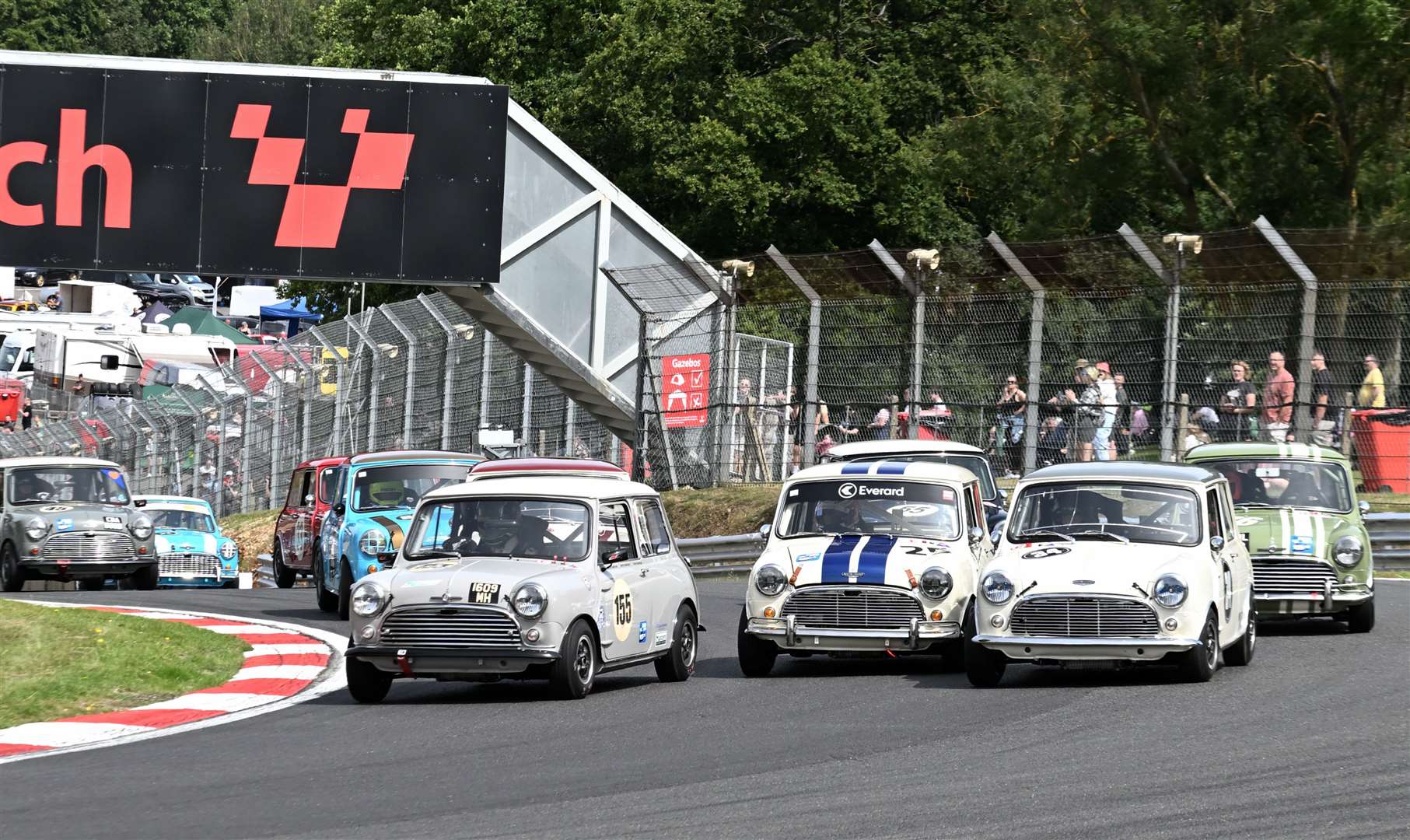 Nathan Heathcote, from Pluckley, finished first and second in the two Sanwa Trophy Pre-66 races. This was the closest anyone got to the former rallycross star in race one. Picture: Simon Hildrew