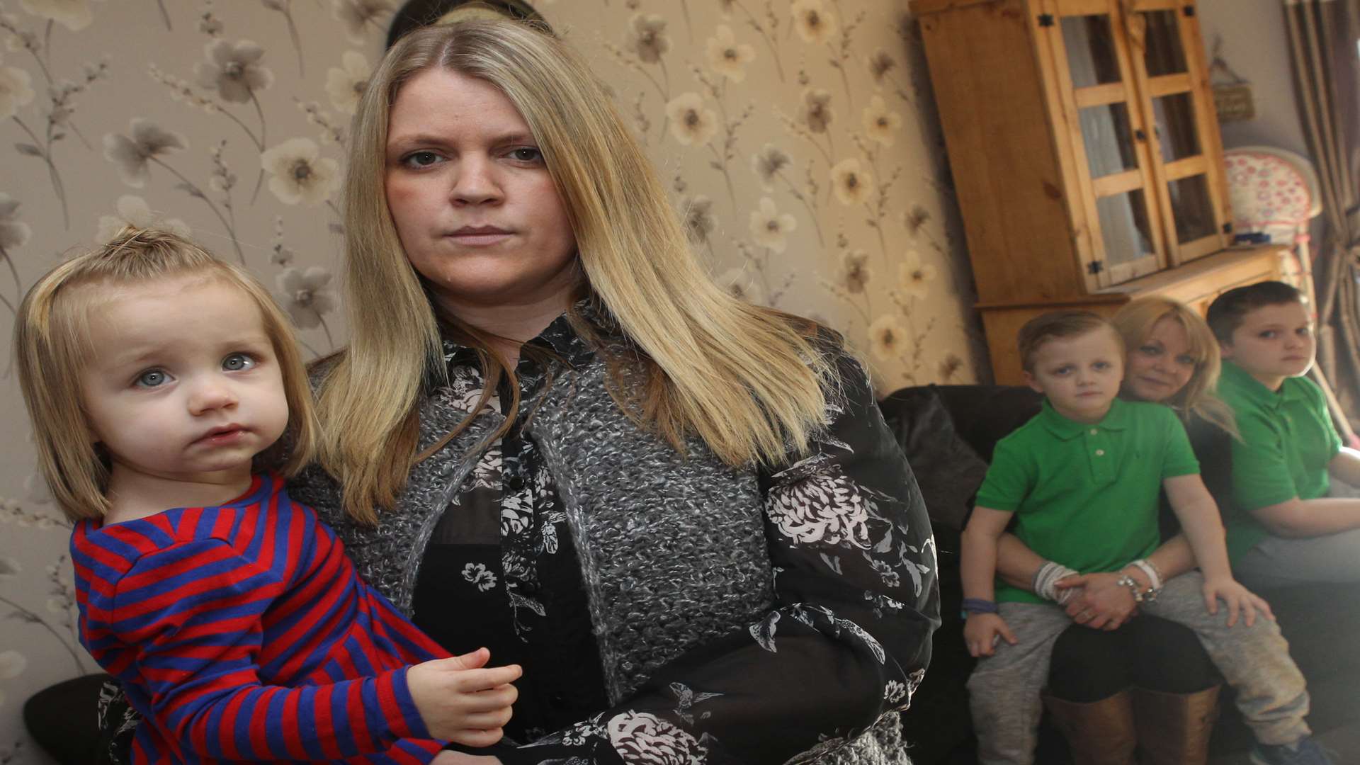 From left, Lisa Lynch with daughter Nancy, 19 months, sons James, six, Jack, 12, and Debbie Mason, mother-in-law not happy about four defective prams