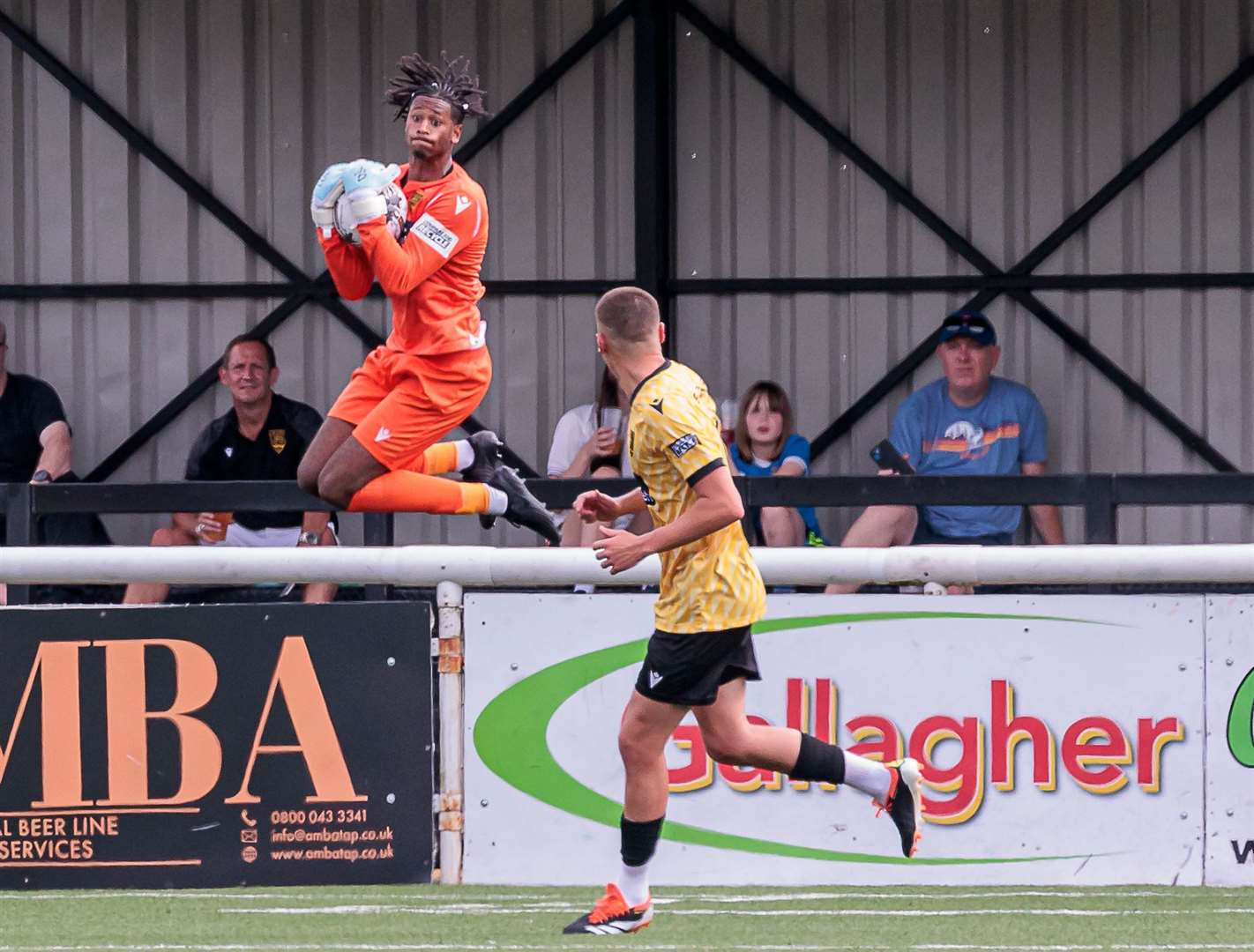 Maidstone's new No.1 Alexis Andre Jr claims a cross against Woking. Picture: Helen Cooper