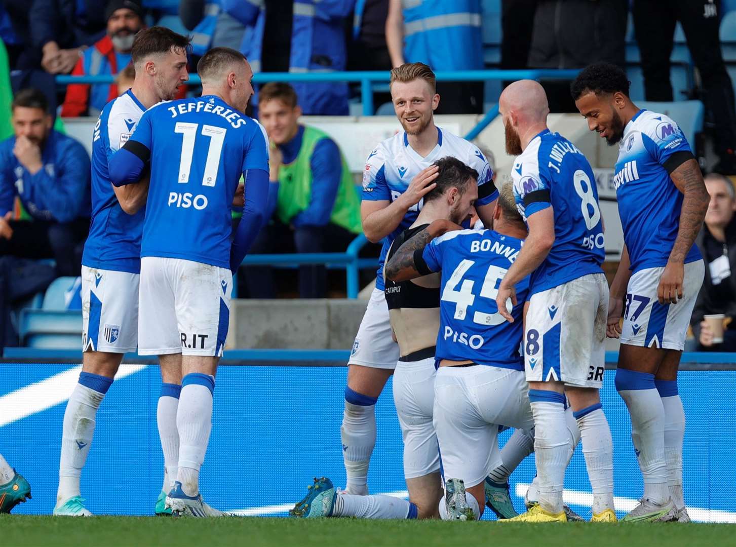 Scott Malone is congratulated by his Gillingham team-mates after scoring on Saturday but he’s a midweek doubt with a back injury Picture @Julian_KPI