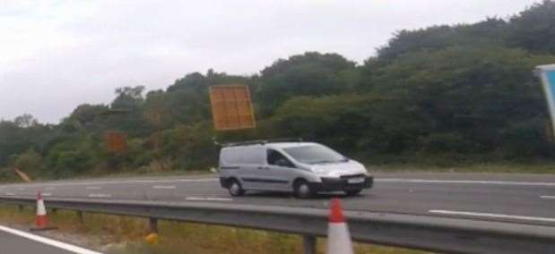 Shocking footage shows fence panels flying of the top of a van on the motorway (39113637)