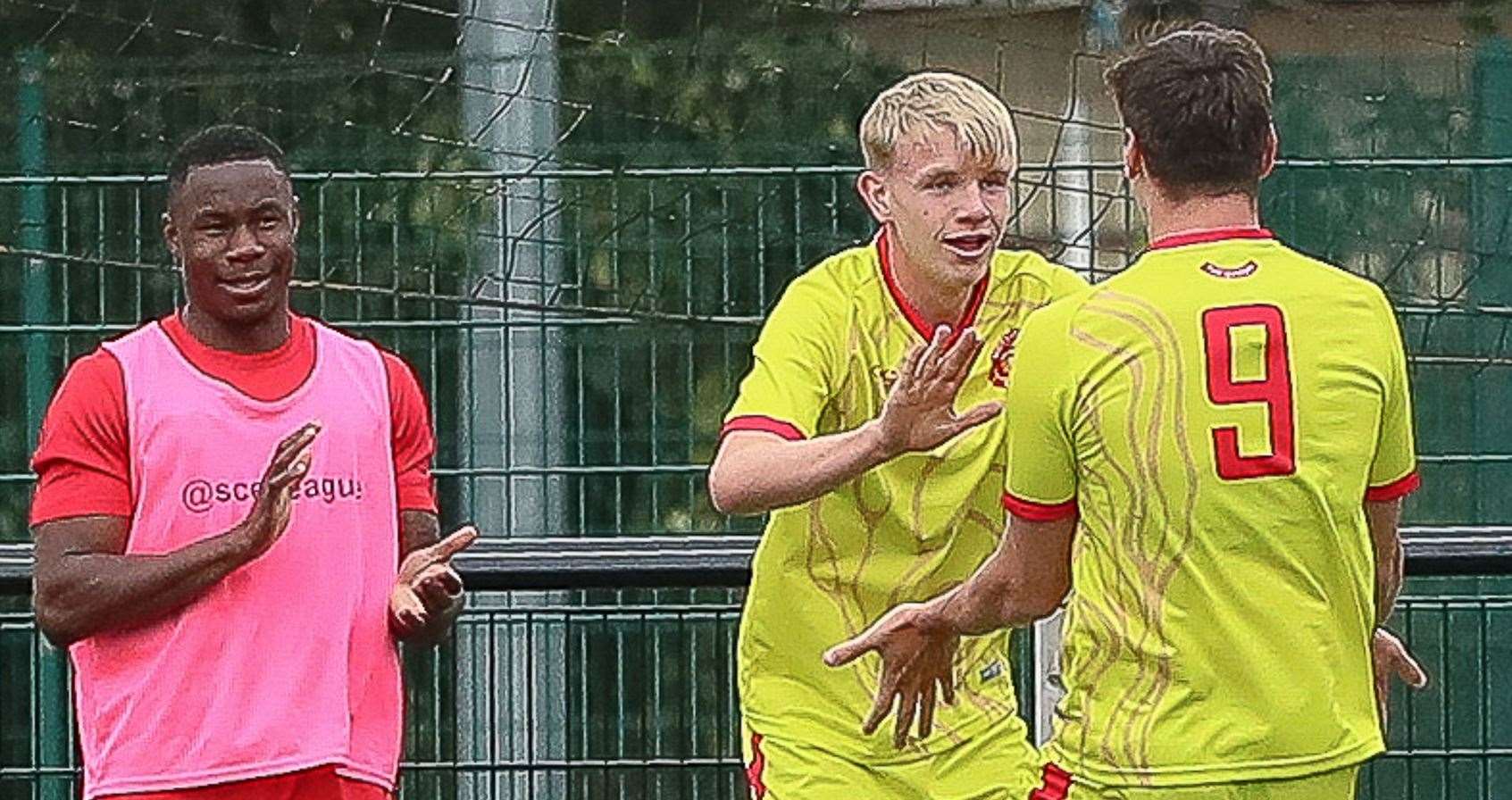 Dover loanee Archie Hatcher celebrates with Whitstable team-mate Harvey Smith at Hollands & Blair. Picture: Les Biggs