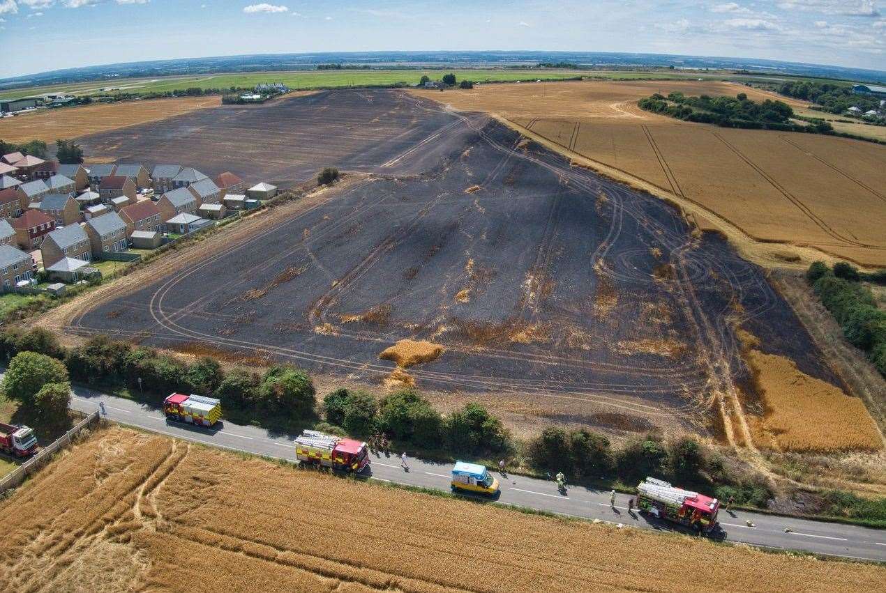 New-build homes surrounded by charred fields. Picture: Get Wild