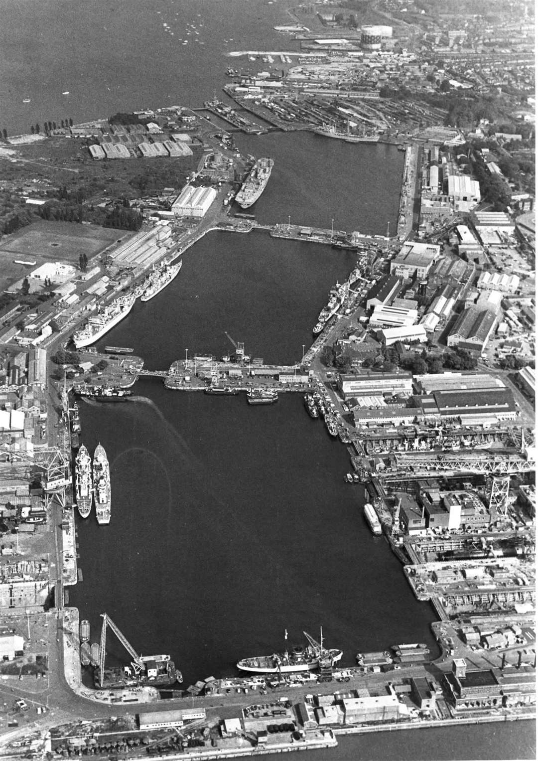 Basin number three - pictured top - is the last remaining industrial dock in use for commercial activity in the former Chatham naval dockyard, pictured here in 1975