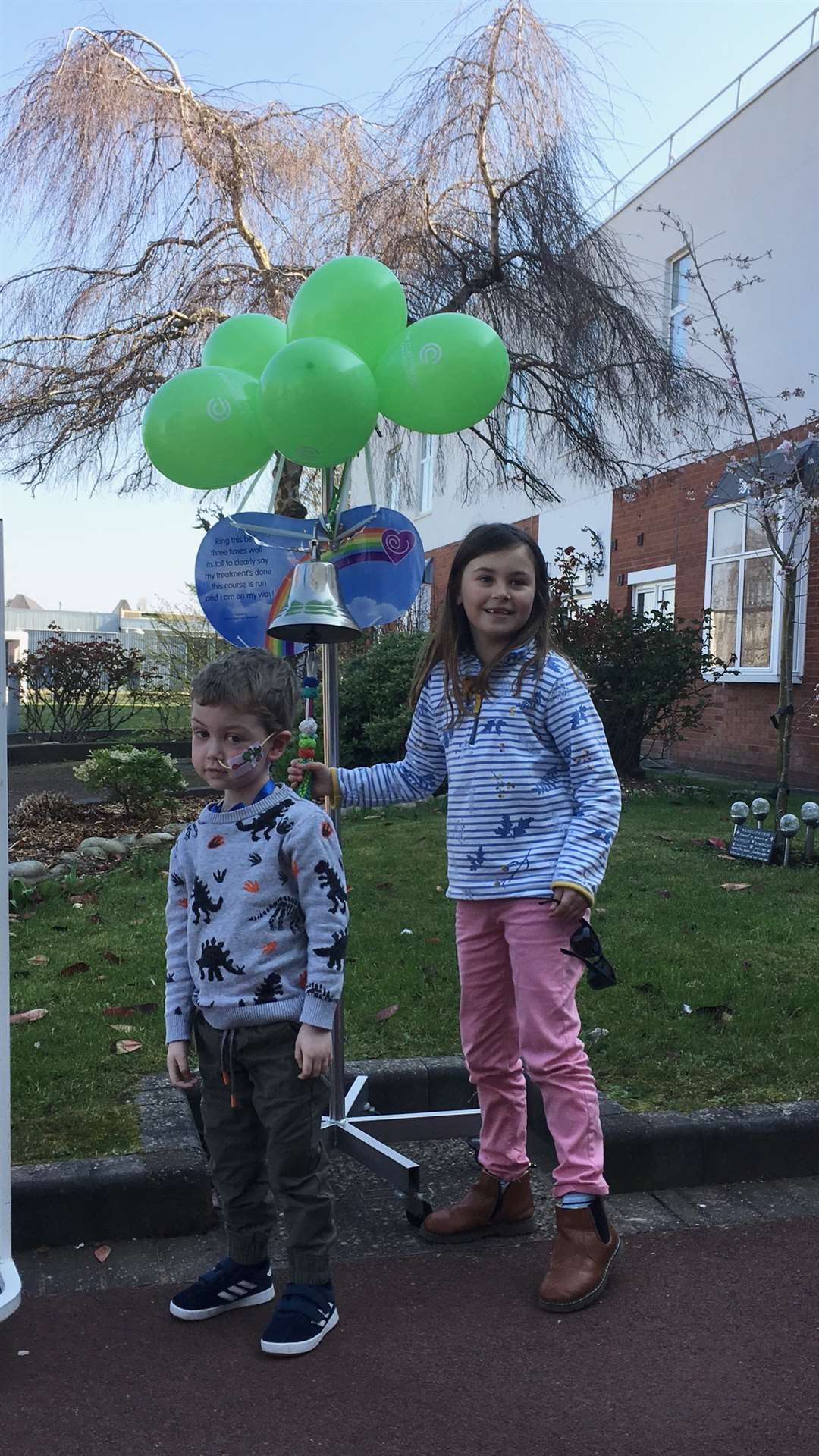 Brodie’s sister Indiana was also able to ring the bell to mark the end of his treatment (Clatterbridge Cancer Centre/PA)