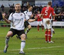 Harry Crawford enjoys the moment after his equaliser for Darts