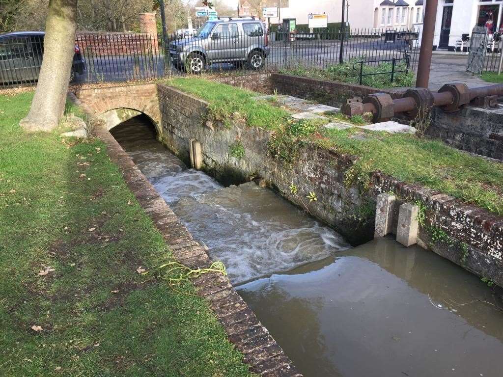 The rest of the family are on the other side of the bridge