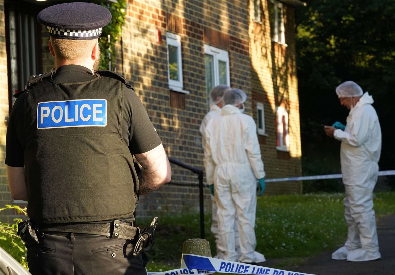 Officers at the scene on Sunday. Picture: Andy Clark