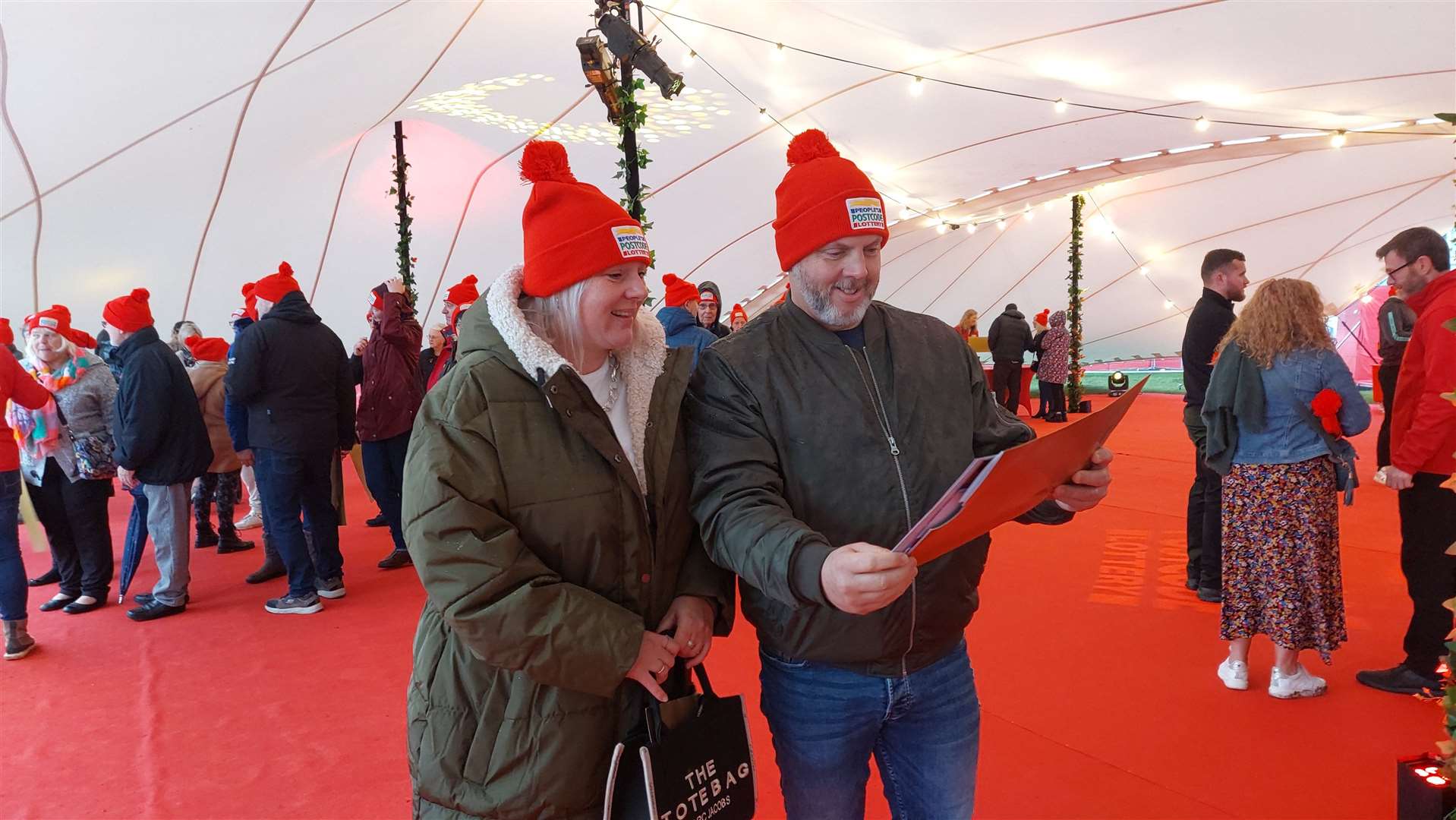 Becky Davey and Clive Burgess opened their envelope to find they won £6,113