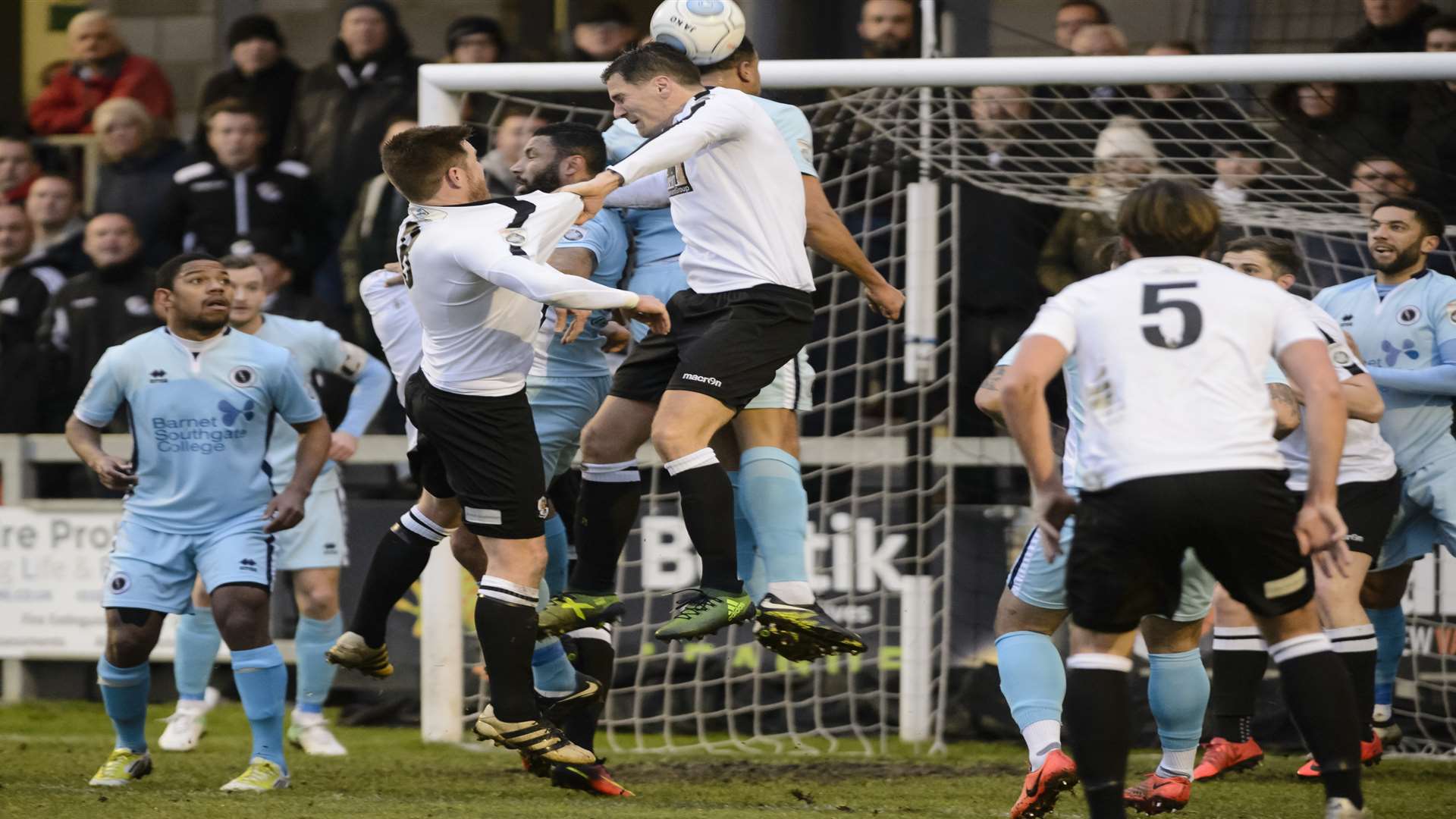 Tom Bonner and captain Elliot Bradbrook compete in the air for Dartford. Picture: Andy Payton