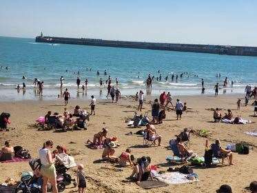 A packed Folkestone beach