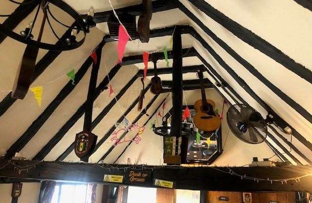 The instruments hanging from the beams upstairs date back to a previous incarnation, when this place used to be The Minstrel