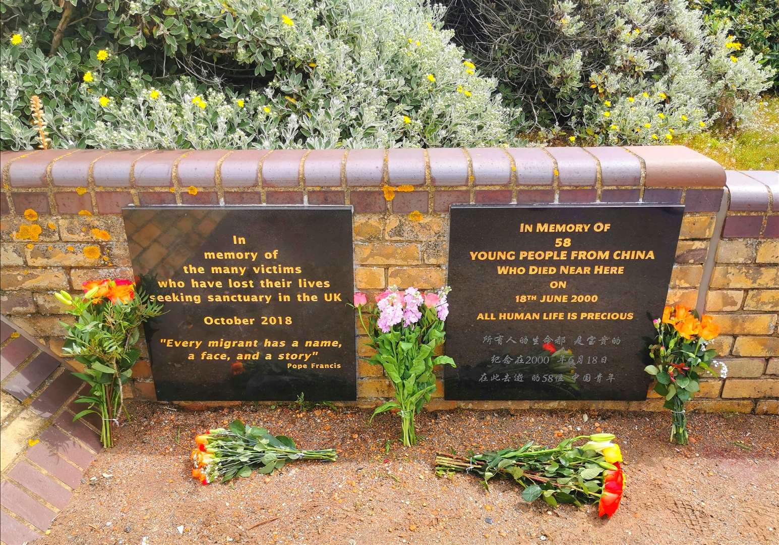 Flowers at the memorial placed during Sunday's vigil. Picture from Martin Bradley