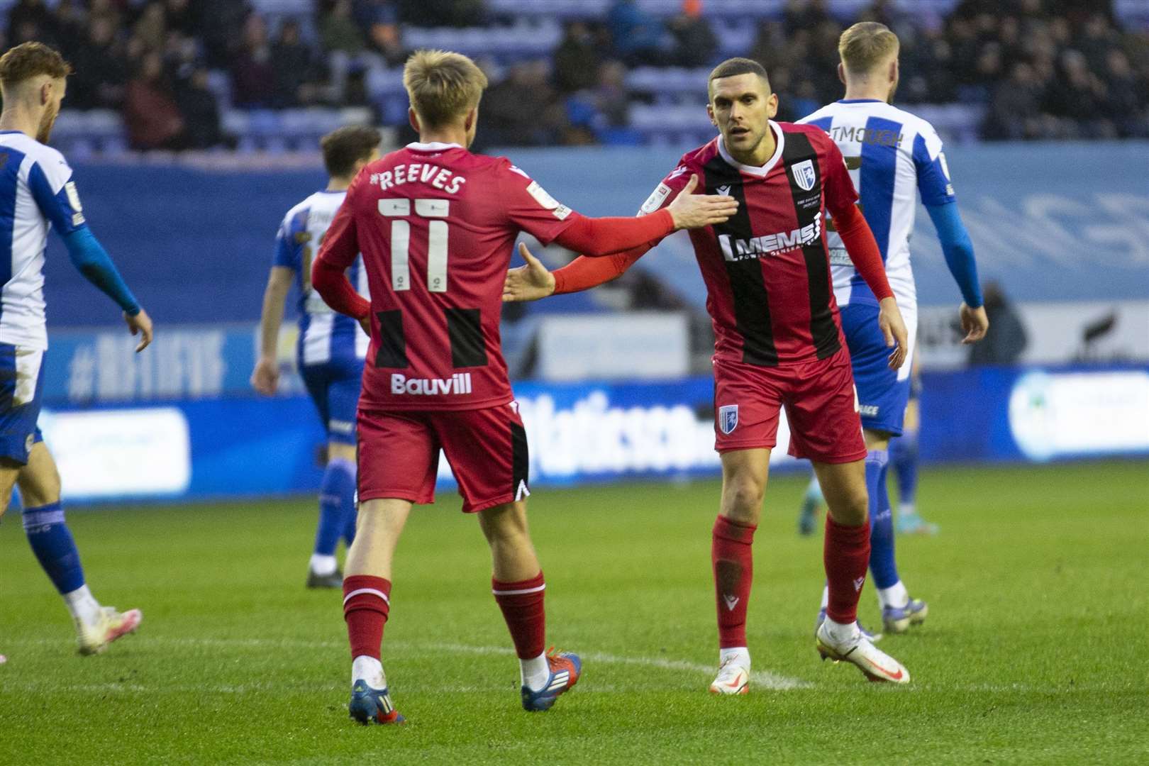 Ben Reeves and Stuart O'Keefe netted for Gillingham at Wigan Picture: KPI