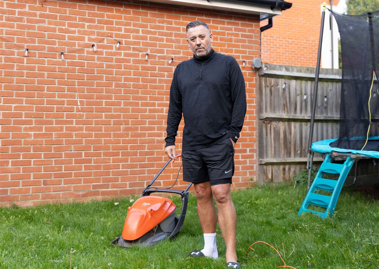 Brian Whitnall standing in his garden at is home near Stansted in Kent (RoSPA/Elizabeth Brown)