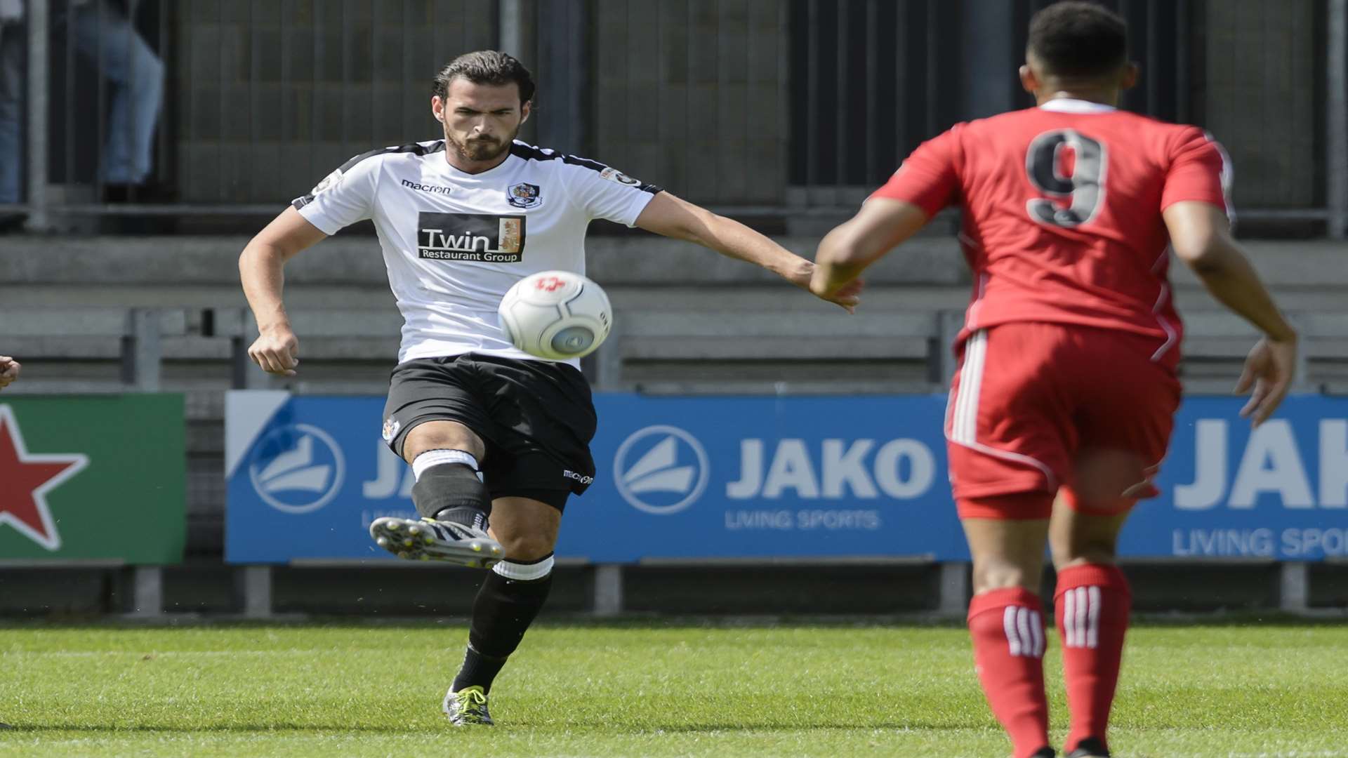 Ronnie Vint plays the ball forward against Hungerford Picture: Andy Payton