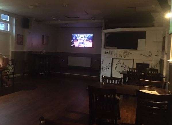 At the far end of the largest room in the pub there is a raised stage for bands and an area for a DJ, but there seems to be some question whether DJs will ever be back at the White Horse.