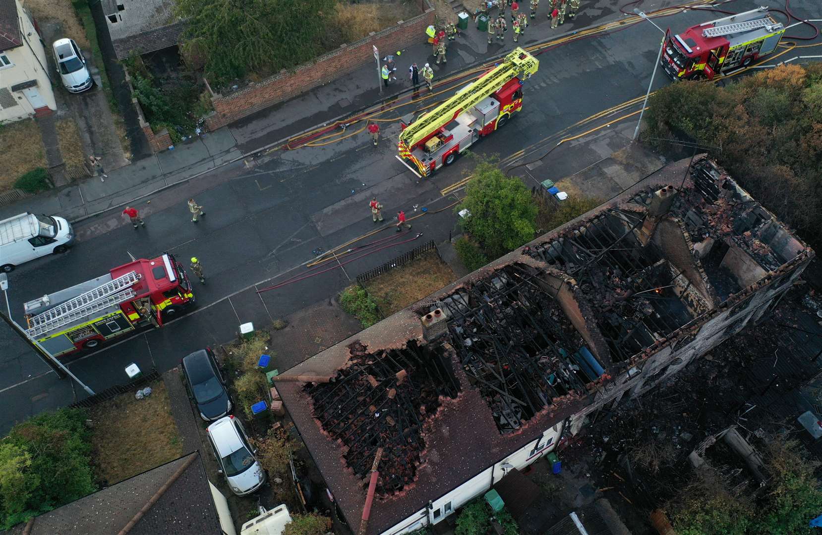 Dramatic aerial pictures show the scale of a huge fire which swept through four homes in Crayford Way, Crayford, near Dartford. Photo: UKNIP