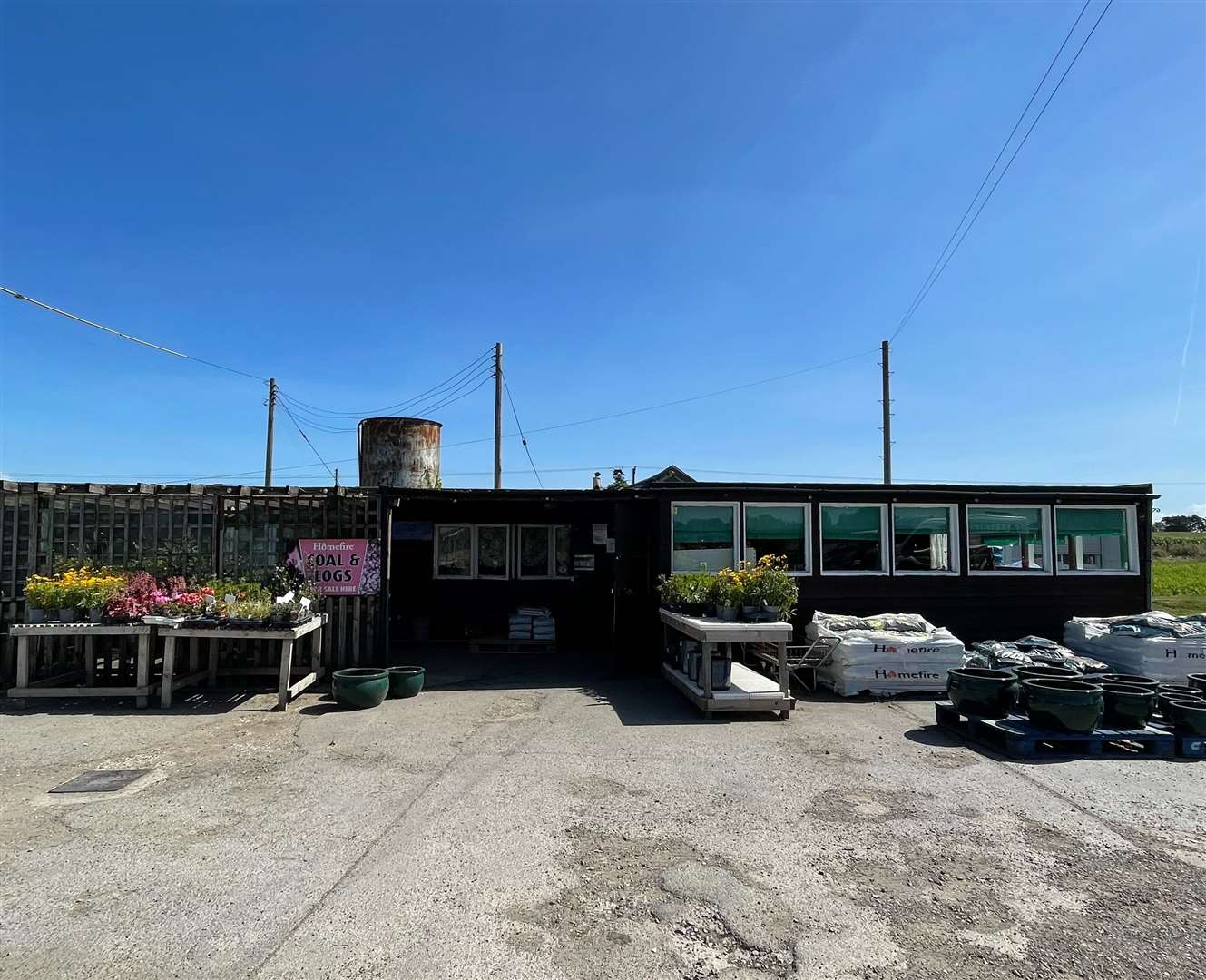 The owners of Delf Farm Shop in Sandwich have put in plans to knock down the current farm shop building and convert an existing barn into a new store with a cafe. Pictures: Delf Farm Shop/DDC planning