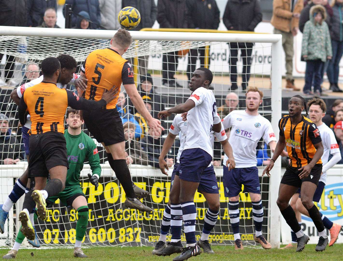 Callum Davies gets his head to the ball for Folkestone. Picture: Randolph File