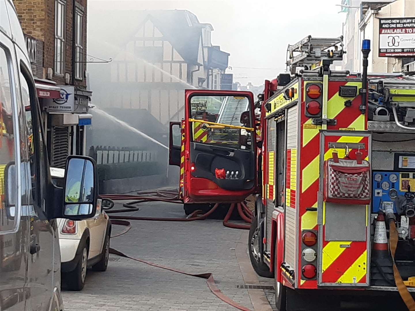 Fire fighters near the Society Rooms in Maidstone shot water onto the building to stop any more burning