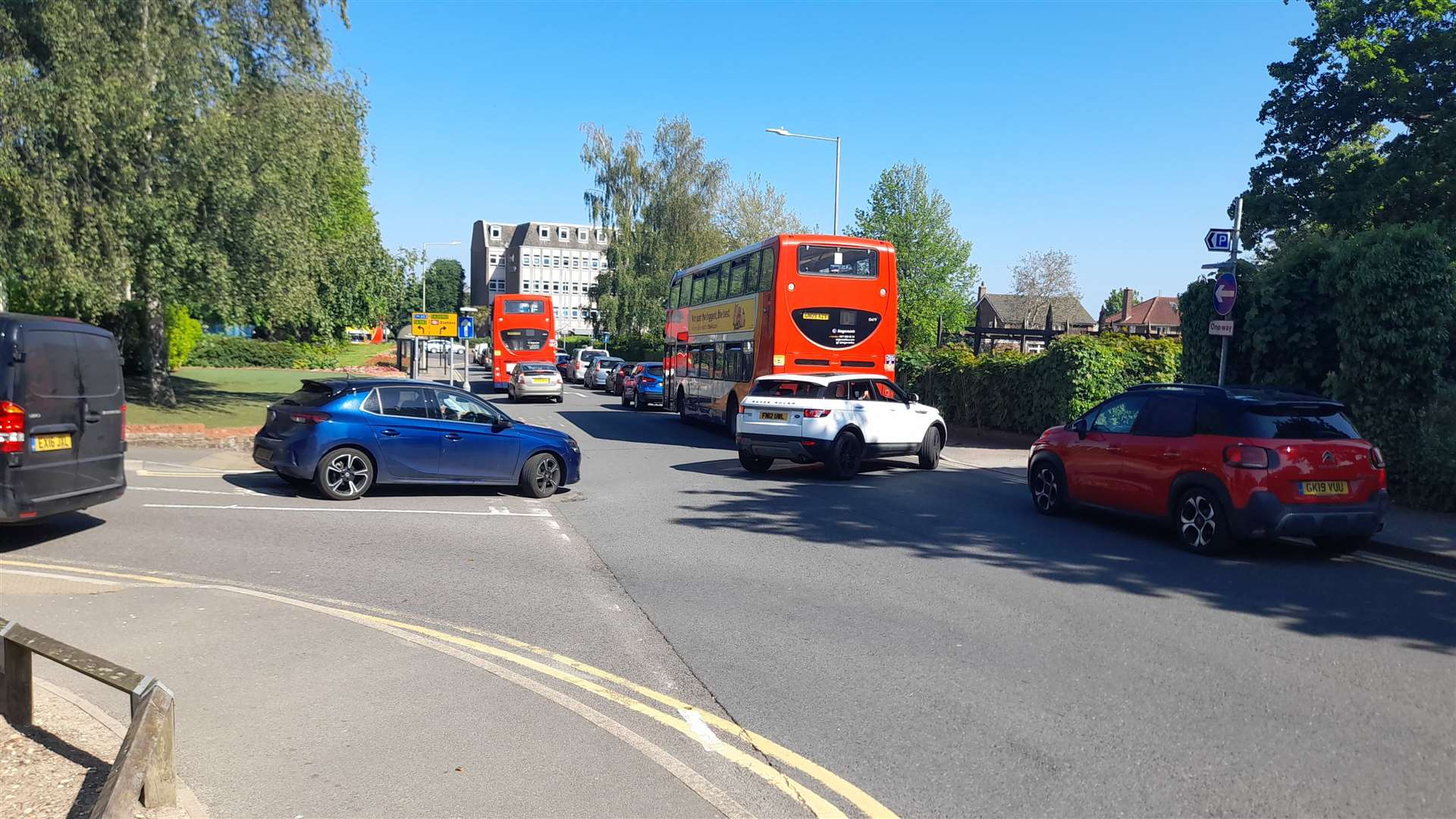 Cars are queuing on nearby Vicarage Lane