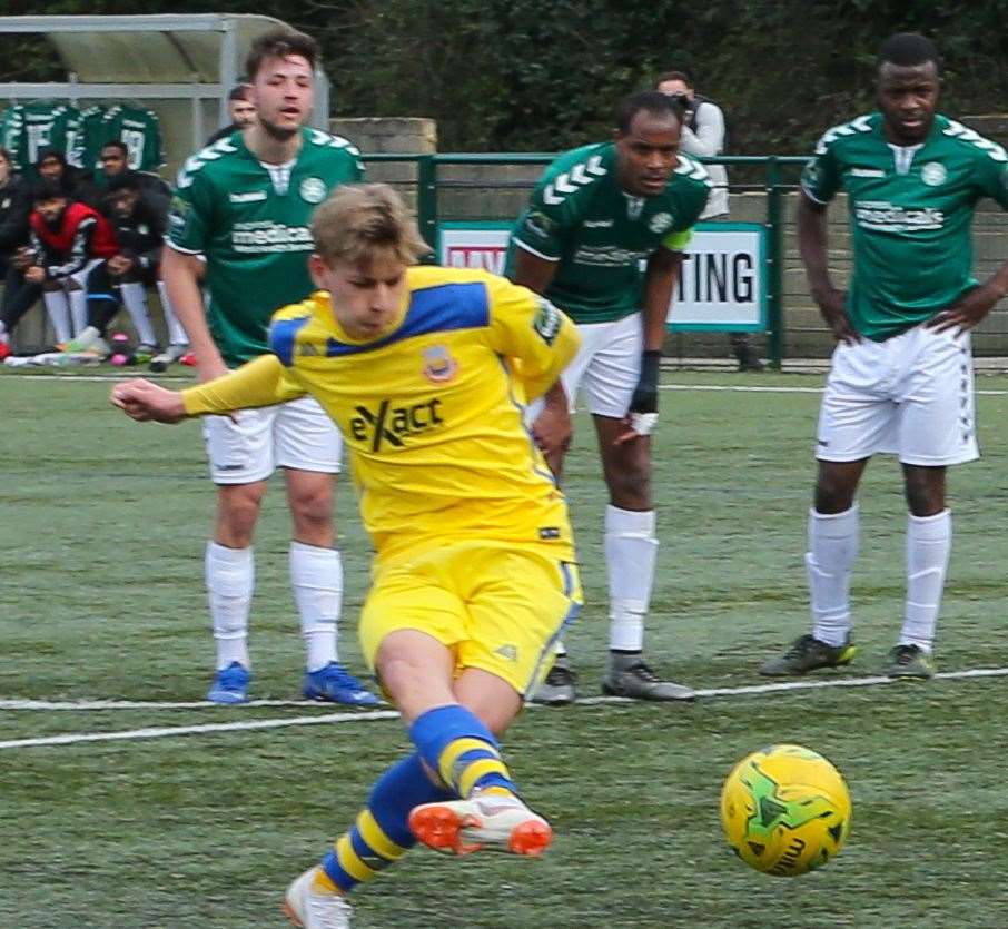 Whitstable's Harry Stannard scores from the spot against Whyteleafe