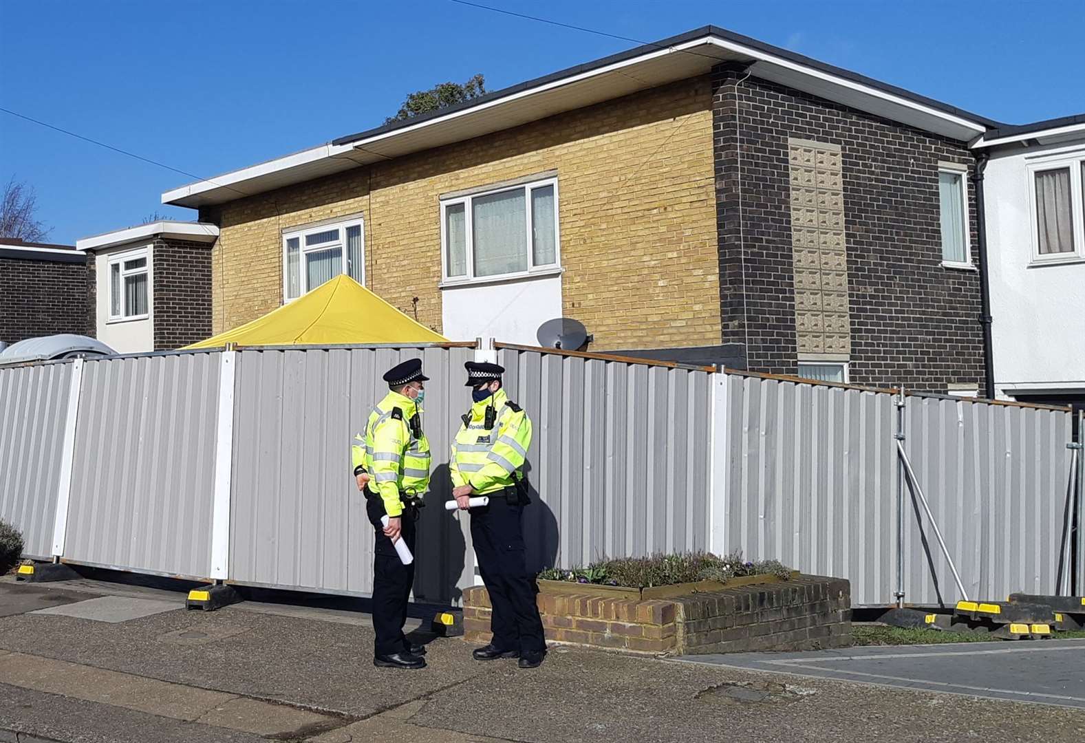 Police in Freemen's Way on the second day of the search