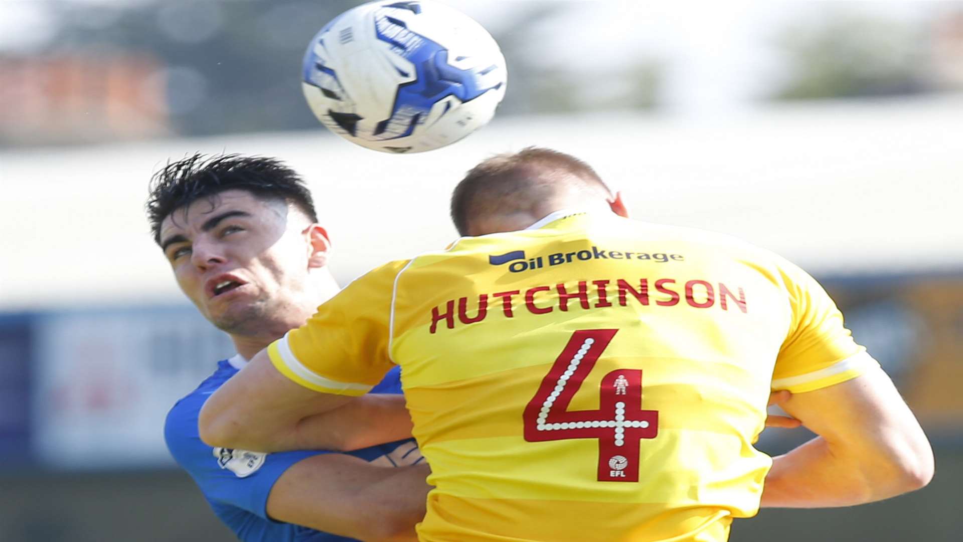 Gillingham's Joe Quigley challenges Millwall's Shaun Hutchinson Picture: Andy Jones