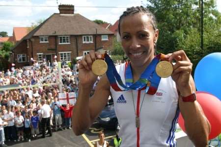 VICTORIOUS: Kelly joins the dpuble decker bus in Hildenborough for her procession