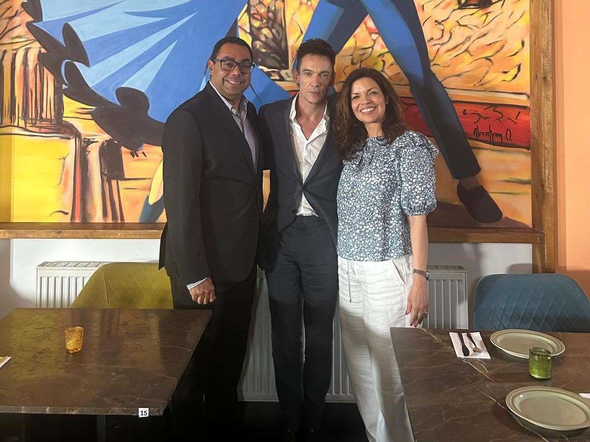 Actor Jonathan Rhys Meyers with restaurateurs Juan Carlos Bejarano and wife Maribel Ramirez