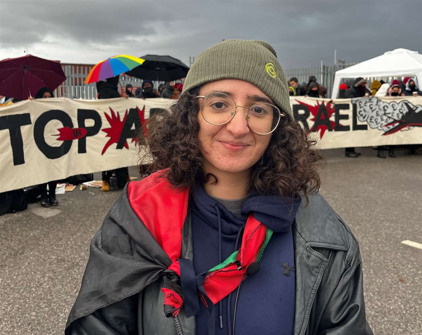 Zad is protesting outside BAE Systems in Laker Street, Rochester